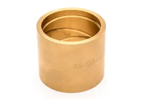 bronze part with laser etching on the side